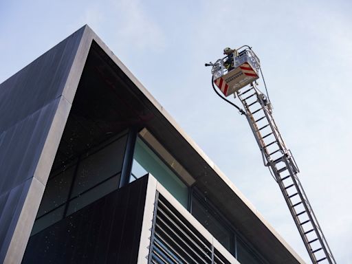 Smoke rises above Copenhagen as Denmark’s taxation ministry evacuated after fire