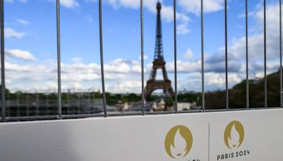 Olympic rings on Eiffel Tower unveiled 50 days ahead of Paris Games