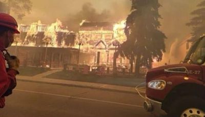 Wildfire that roared into Jasper was a wall of fast-moving flame, says fire official | CBC News