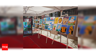 Kolkata hosts open-air exhibition to celebrate the artwork of specially-abled children | Bengali Movie News - Times of India