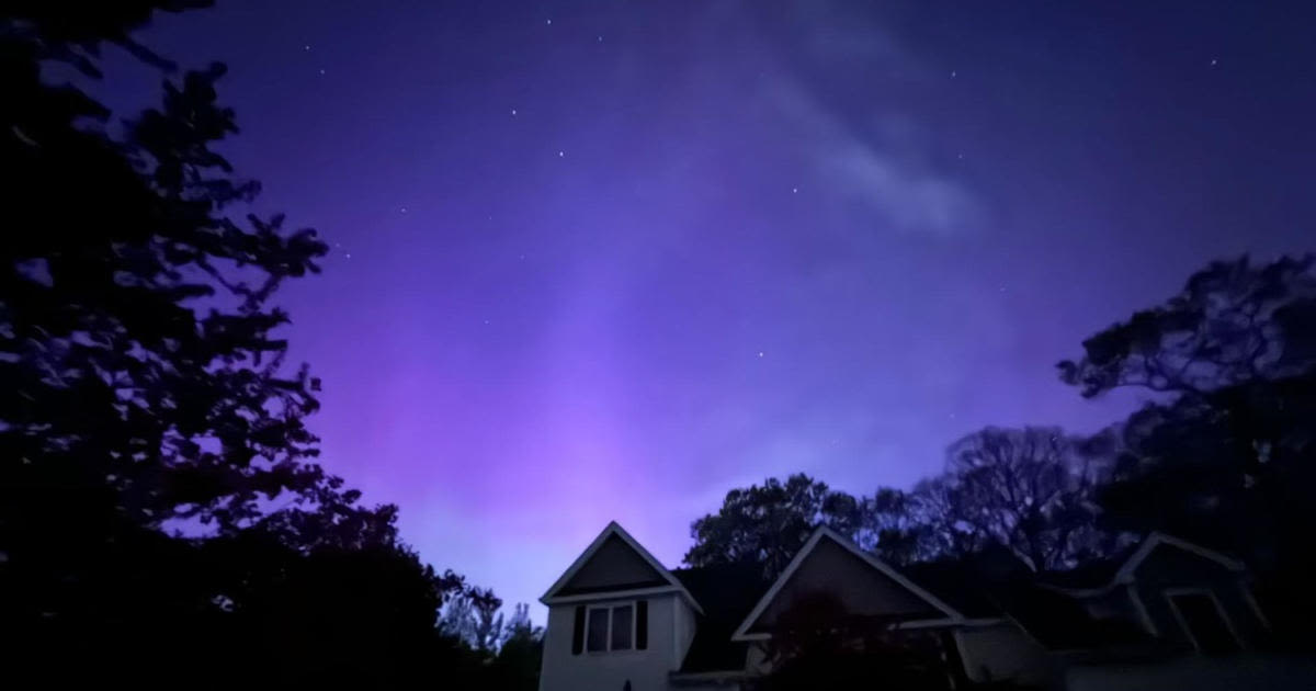 Photos show northern lights illuminating the sky around New England