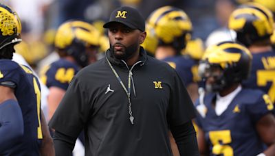 Michigan coach Sherrone Moore officially signs contract