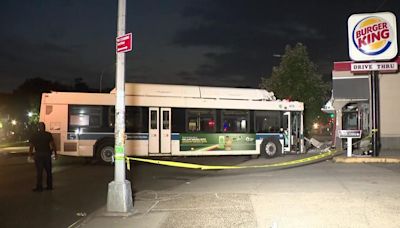 MTA bus crashes into Burger King in Brooklyn. Video shows the moment it loses control.