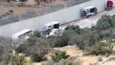 Palestinian truckers fear for safety after convoy for Gaza wrecked