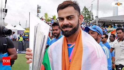 Is this the wallpaper on Virat Kohli's phone, internet speculates - Times of India