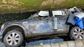 Land Rover found floating on its side in West Midlands canal