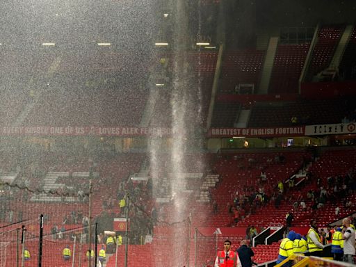 Watch: Manchester United look at new Old Trafford roof after rain gushes into Arsenal dressing room