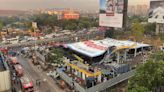 Huge billboard toppled by storm kills more than a dozen people in India