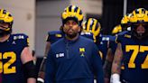 Michigan promotes offensive coordinator Sherrone Moore to replace Jim Harbaugh