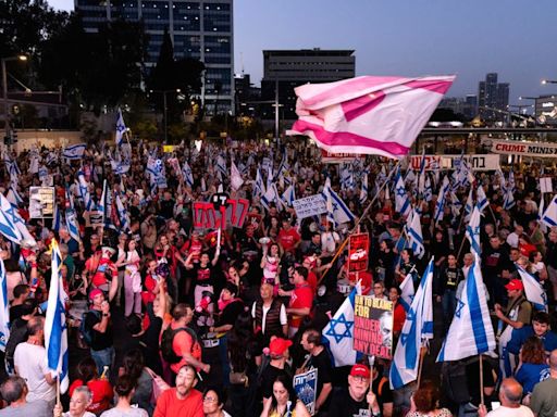 Israel-Gaza war: Tens of thousands rally for hostage deal as Gaza ceasefire talks continue