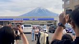 To fend off tourists, a town in Japan is building a big screen blocking the view of Mount Fuji