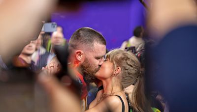 Travis Kelce Packs on the PDA With Taylor Swift at Mahomes Charity Auction