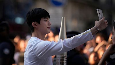 K-pop stars and athletes: Who carried the Olympic torch through Paris?