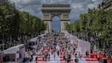 Paris' famous Champs-Élysées transformed into a massive free picnic with treats from famous chefs