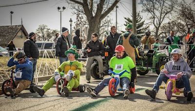 Big Wheels ain’t just for kids, especially when they’re raced in West Dundee to celebrate Emmett’s 25th anniversary