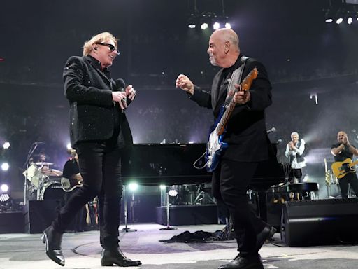 “Who knew Billy could play guitar?” Billy Joel rocks a Strat with Axl Rose in surprise cover of AC/DC’s Highway to Hell