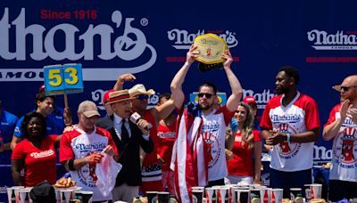Hot Dog! Patrick Bertoletti Is New Champ At Coney Island Eating Contest, Succeeding The Vegan-Endorsing & Banned Joey...