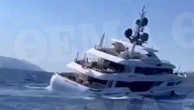 Moment luxury yacht with tourists on board starts sinking off Greece