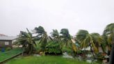 Lisa weakens to tropical storm after leaving Belize's main port in dark