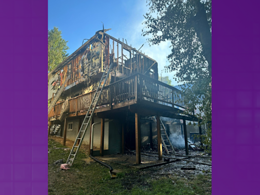 WATCH: Fire devours roof of Laurel home, displacing 9