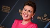 Kelly Clarkson Wins Best Talk Show Award With Sharp Shoulders in Hot Pink Alex Perry Dress at Daytime Emmy Awards 2024