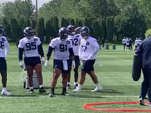 Top NFL draft choice Byron Murphy in a pass-rush drill in Seahawks rookie minicamp