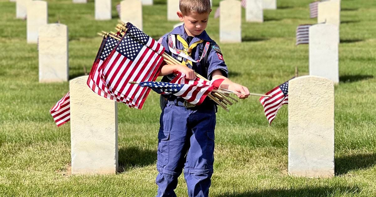 Scouts honor veterans ahead of Memorial Day at Dayton National Cemetery