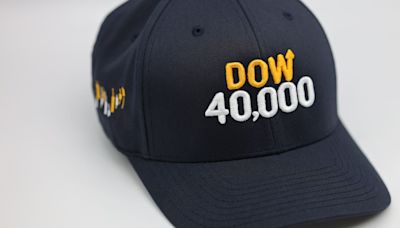 The folks who are most excited about Dow 40,000? The hat sellers.