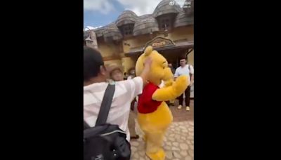 Un-bear-able: Shanghai Disneyland visitor slaps Winnie the Pooh mascot in viral clip (VIDEO)