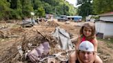 One flood-ravaged Kentucky community is suing a coal company, saying its negligence made damage even worse