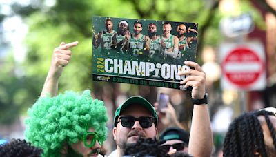 Best signs from Celtics championship parade: Fans troll Luka, Embiid