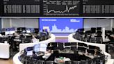 European shares hit one-month high as more earnings roll in