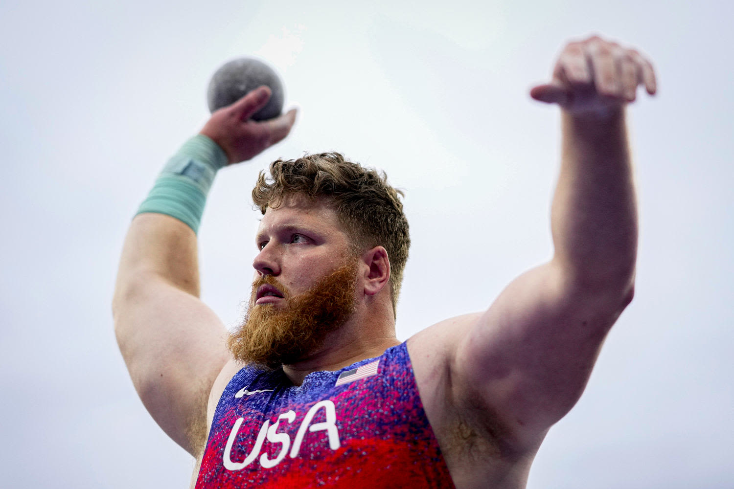 American Ryan Crouser wins third straight Olympic gold medal in shot put