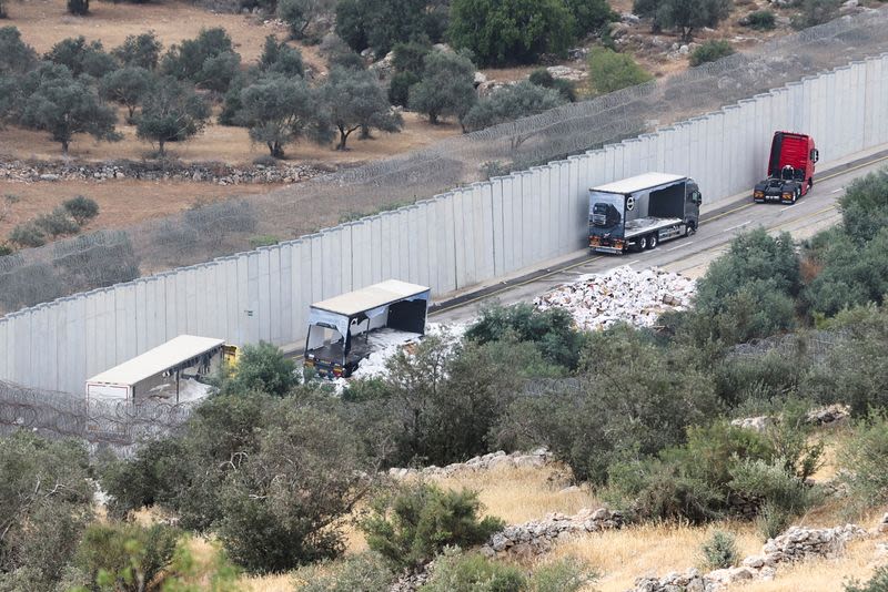 Palestinian truckers fear for safety after aid convoy for Gaza wrecked