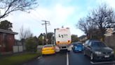 Garbage Truck Takes Out Australian Muscle Car