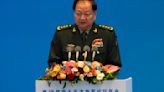 Chinese general takes a harsh line on Taiwan and other disputes at an international naval gathering