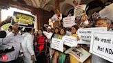 INDIA bloc MPs protest over 'discrimination' against opposition-ruled states in Union Budget - The Economic Times