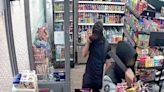 Watch: Moment machete-wielding thug was locked in shop by heroic staff after attempted robbery