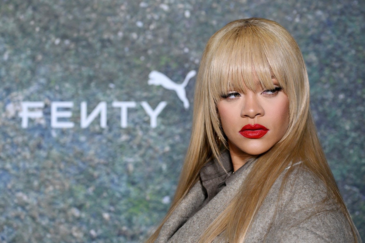 Rihanna debuts dramatic blonde fringe at her Fenty X PUMA collaboration in London