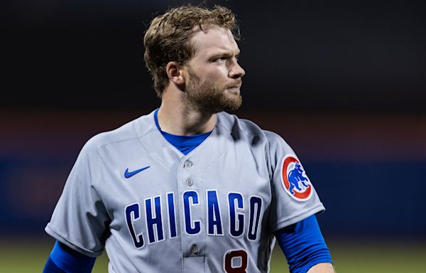 Watch: Ian Happ, Cubs win on controversial double play vs. Mets