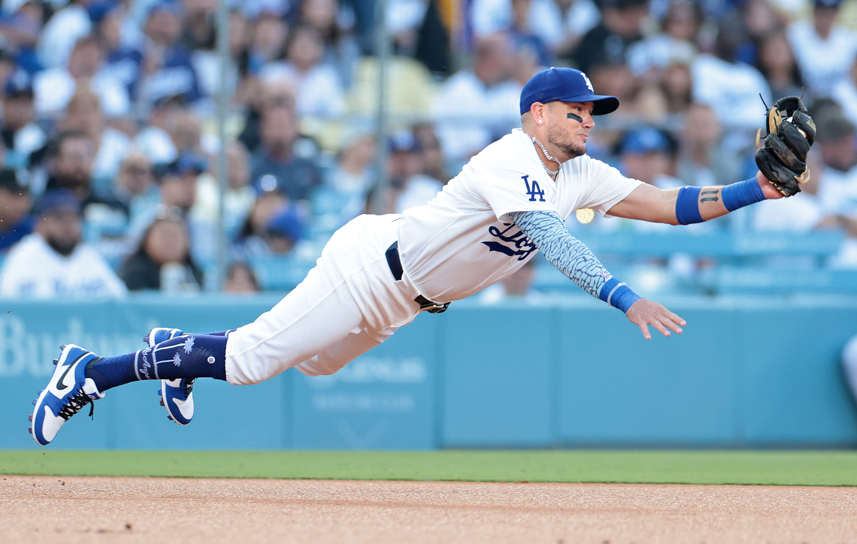 Miguel Rojas is shining at shortstop. Will Dodgers keep him there when Mookie Betts returns?