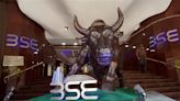 Sensex, Nifty settle lower ahead of Budget