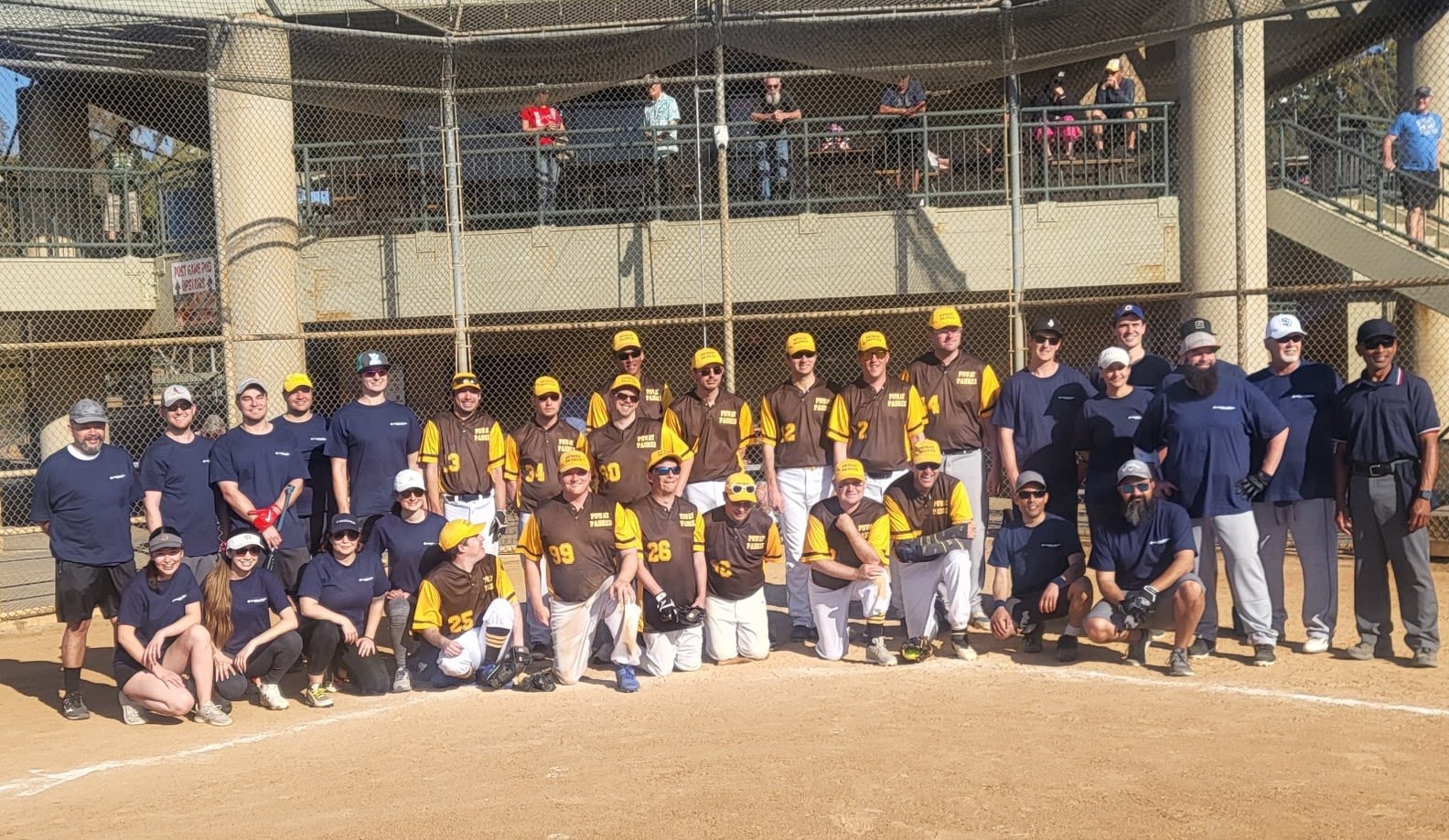 Poway Padres play a friendly softball game against General Atomics staff