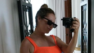 Pregnant Ashley Tisdale puts her bump on display in a bikini on babymoon