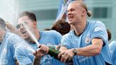 Pictured: Man City celebrate title success with open-top bus parade under threatening skies