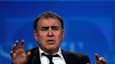 "Dr. Doom" economist Nouriel Roubini says stocks could plunge another 50% as the US heads towards a severe financial crisis