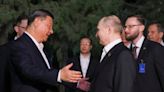 Vladimir Putin tours ‘Little Moscow’ as he trumpets deepening ties with China
