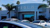 Morning Bid: New records as jobs scanned, Tesla jumps