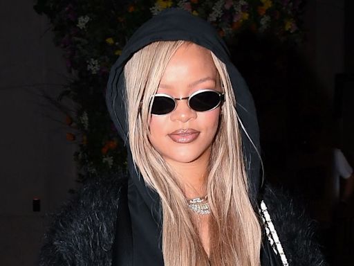 Rihanna Steps Out With Whole Family Wearing a Fluffy Wrap Over a Teal Corset