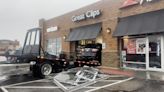 At least 1 injured after SUV slams through local Great Clips